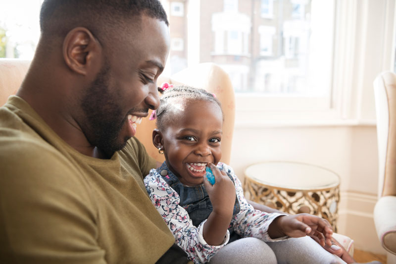 Father and daughter playing