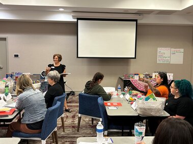 A group of individuals attending a training workshop